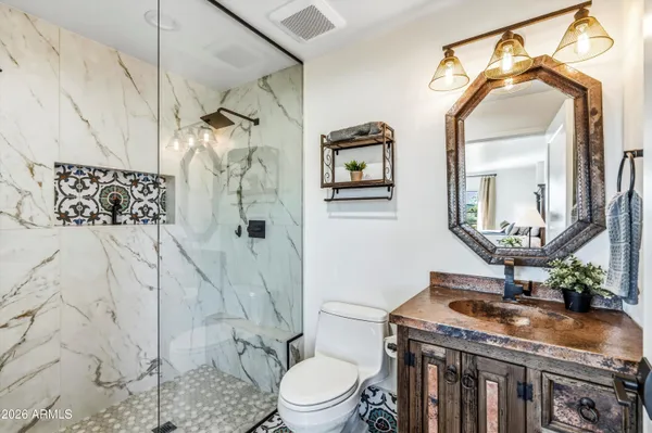 a view of a terrace with a garden and a mountain