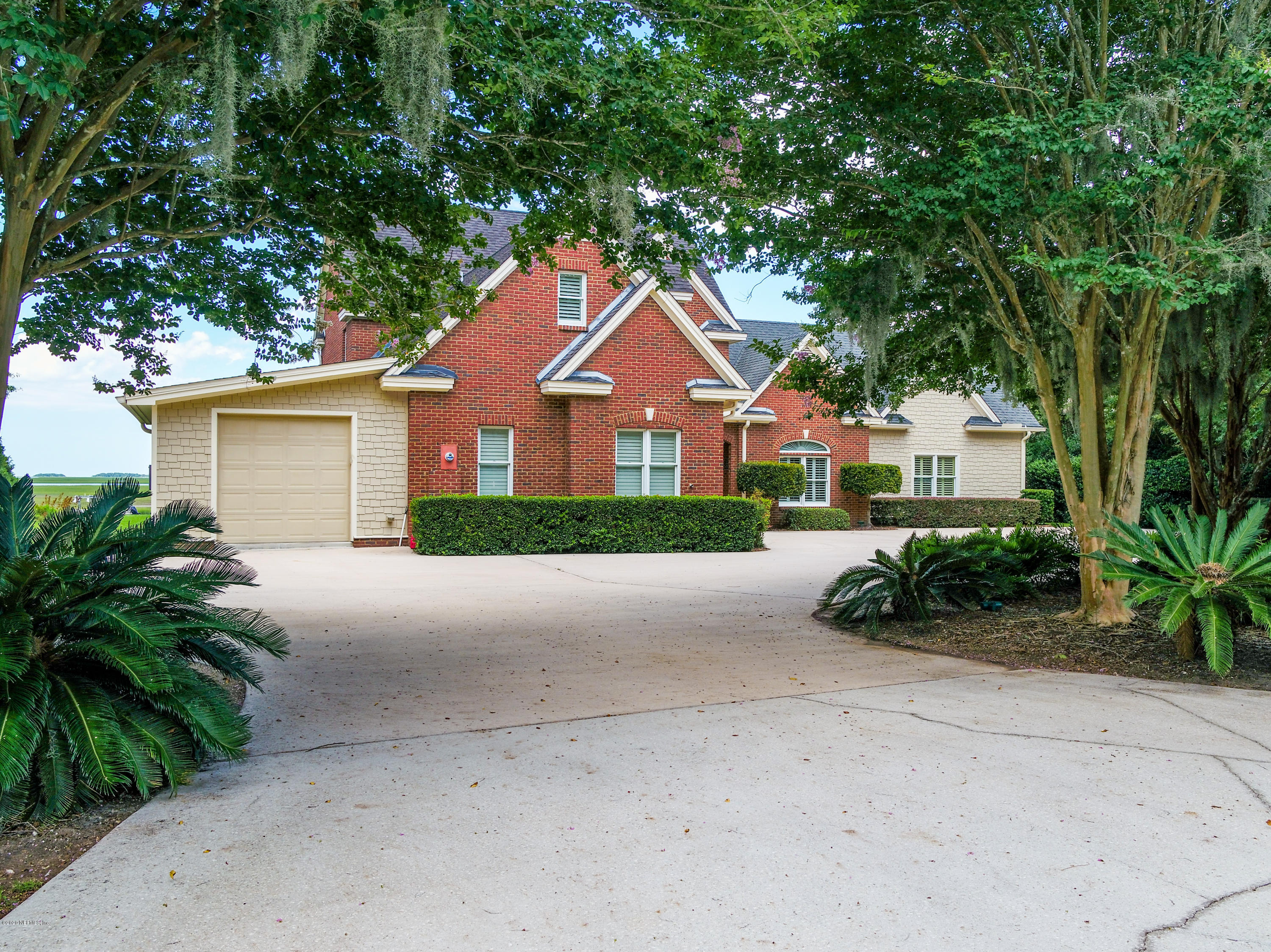 97432 Pirates Point Road Yulee, FL 32097 - Photo 3 of 35 Left Front