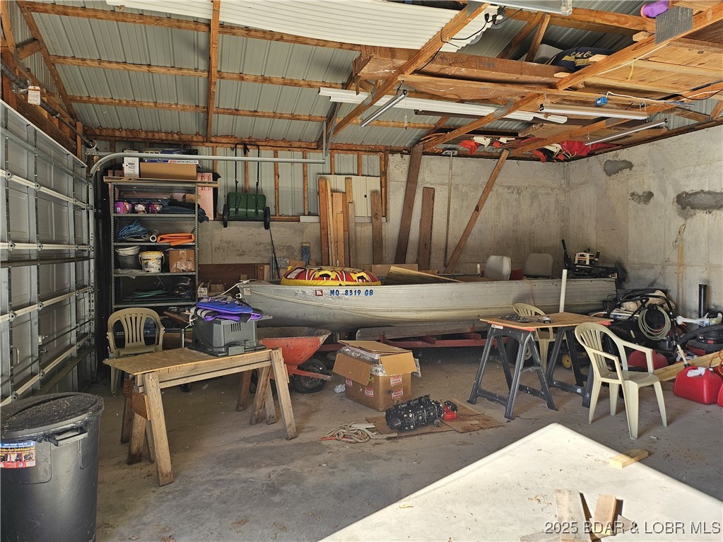 33 Zebco Court Edwards, MO 65326 - Photo 12 of 50 Interior of garage, lots of room for cars, tools,