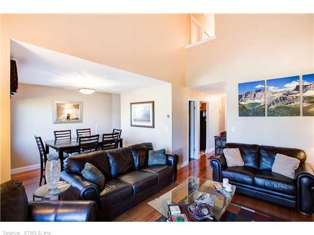 100 Hemlock Road, Unit 91 Branford, CT 06405 - Photo 1 of 1 Living Room. Large, open living room with vaulted ceilings and gorgeous hardwood floors!