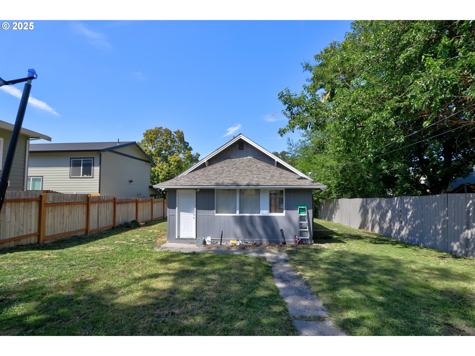 804 East 13th Street The Dalles, OR 97058 - Photo 15 of 20 a view of an house with backyard space and garden
