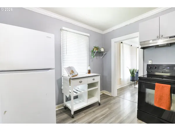 a view of a living room and dining room