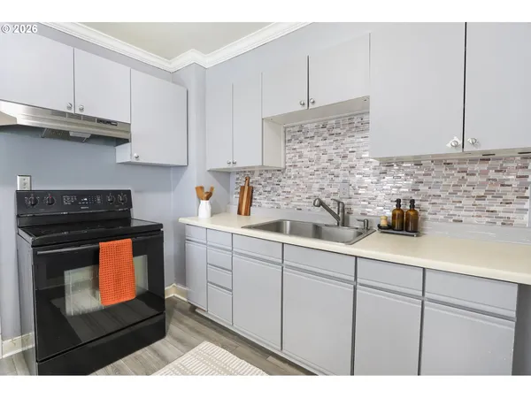 a view of a hallway with stairs