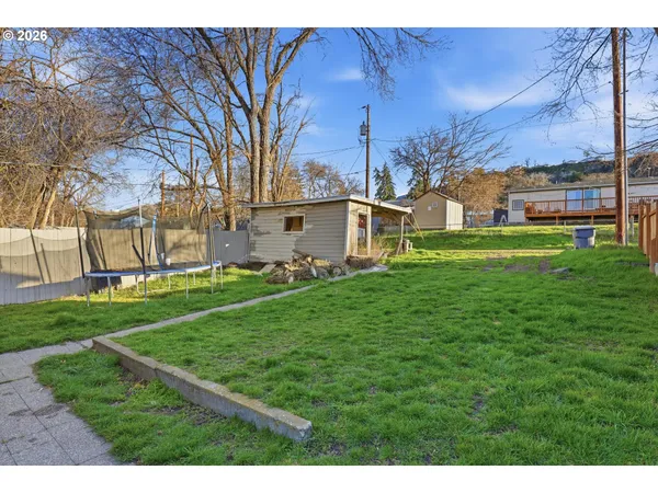 a view of a yard in front of a house