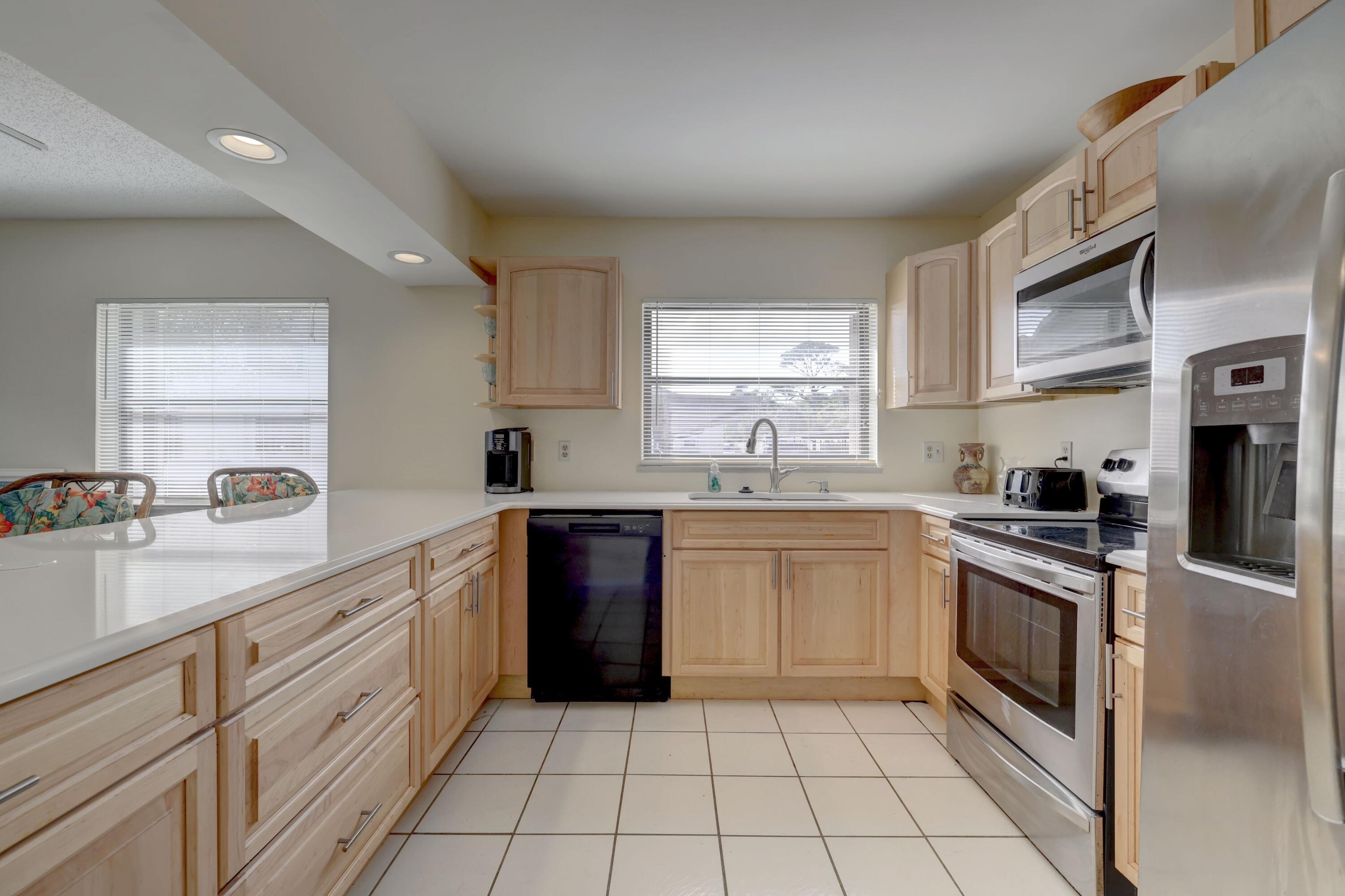 1871 Southwest Palm City Road, Unit 101 Stuart, FL 34994 - Photo 5 of 33 04_632a2067_68_69_70_71