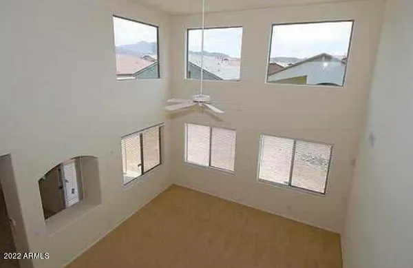 a view of an empty room and window