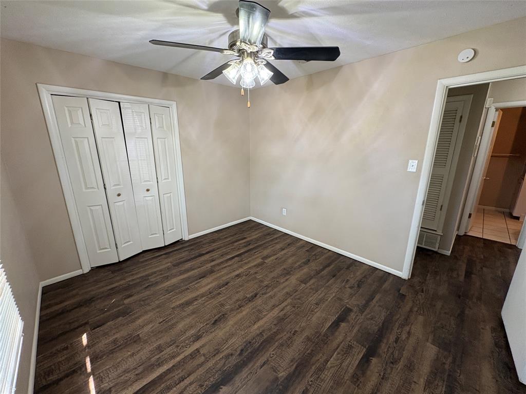 1111 Duane Street Benbrook, TX 76126 - Photo 15 of 28 wooden floor in an empty room