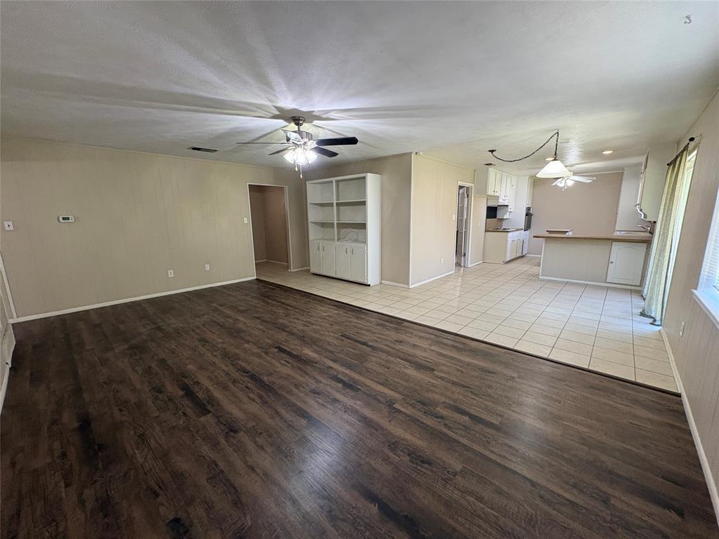 1111 Duane Street Benbrook, TX 76126 - Photo 4 of 28 a view of empty room with wooden floor