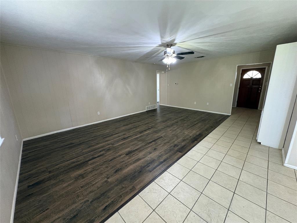 1111 Duane Street Benbrook, TX 76126 - Photo 5 of 28 wooden floor in an empty room