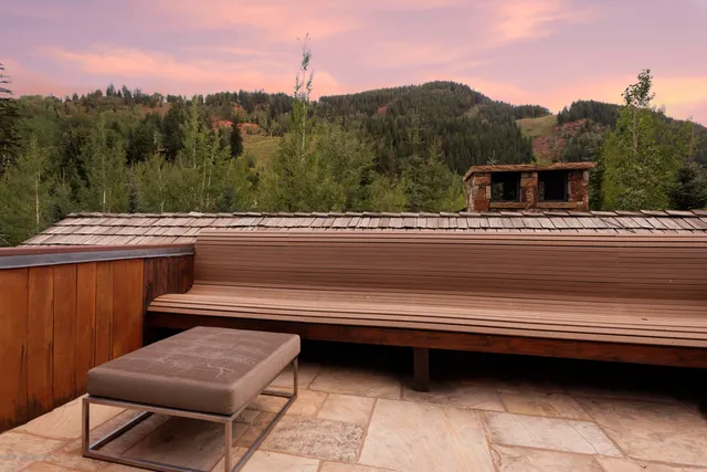 a view of a livingroom with furniture and a flat screen tv