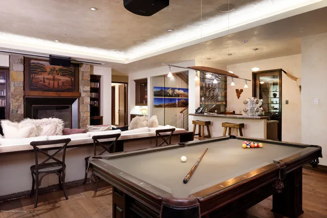 a bedroom with bed and a couch