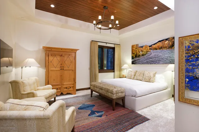 a bathroom with a sink vanity and mirror