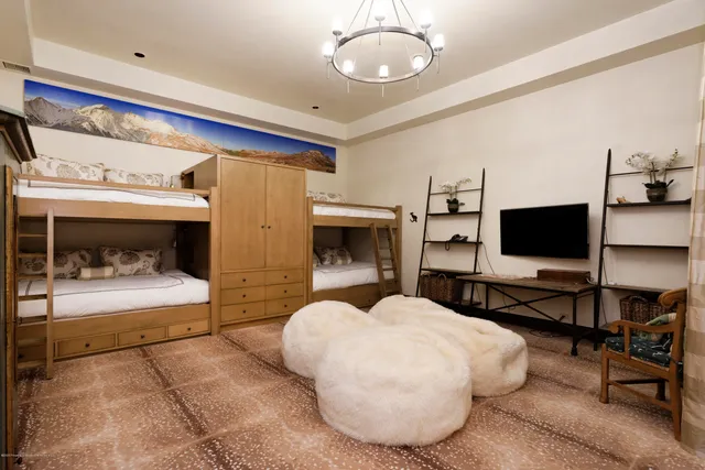 a view of a chairs and table in patio