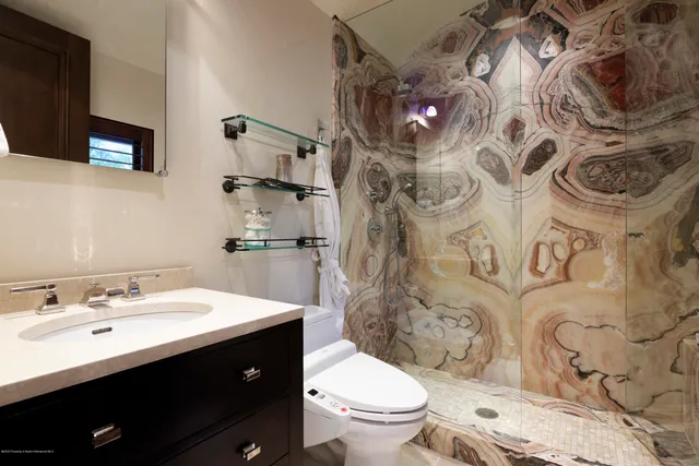 a view of a swimming pool with a patio