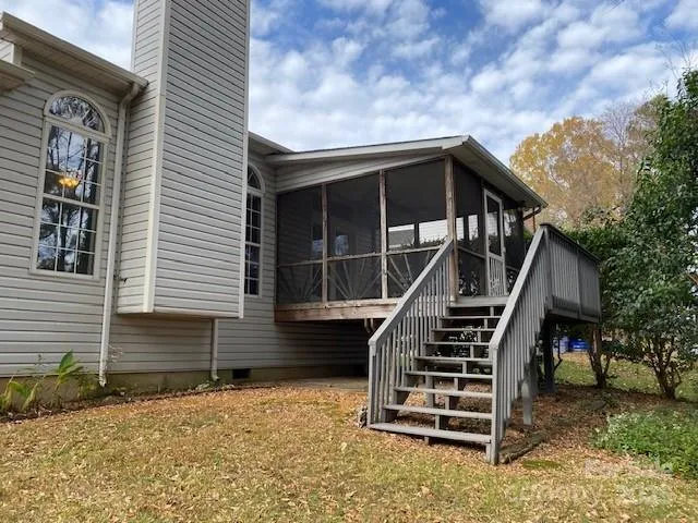 a front view of a house with stairs