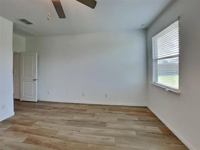 a view of an empty room with window
