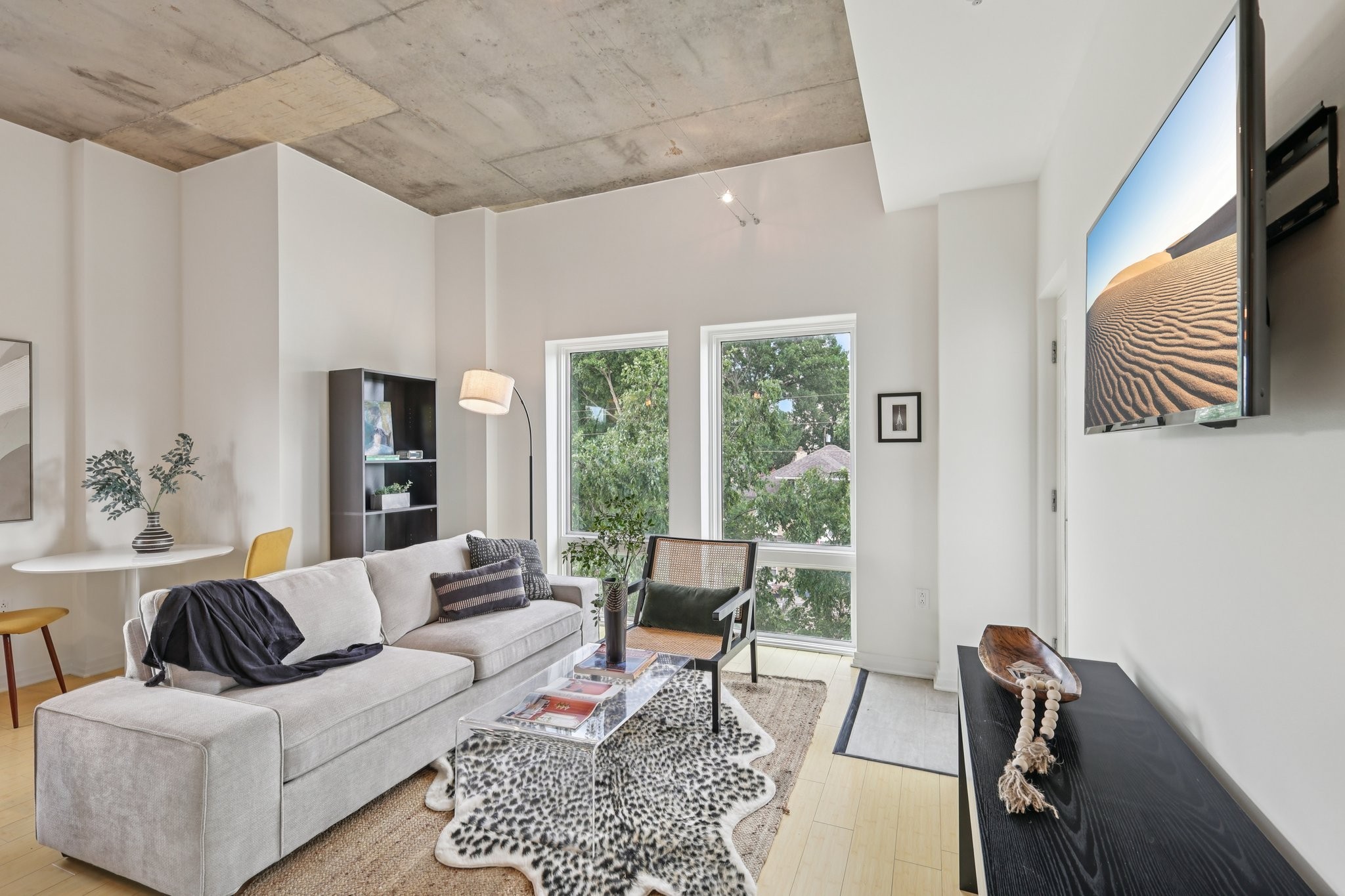 1101 18th Avenue South, Unit 401 Nashville, TN 37212 - Photo 4 of 17 a living room with furniture and a window