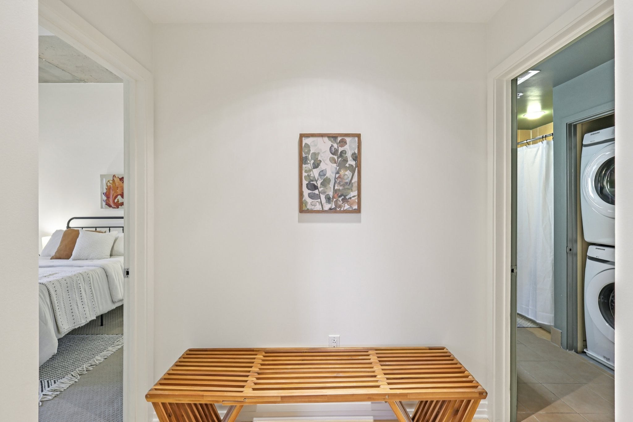 1101 18th Avenue South, Unit 401 Nashville, TN 37212 - Photo 10 of 17 a view of room with stairs and wooden floor