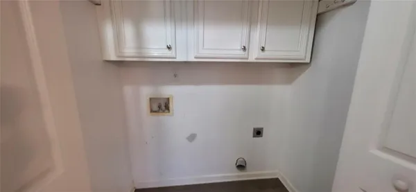 a view of cabinets and window