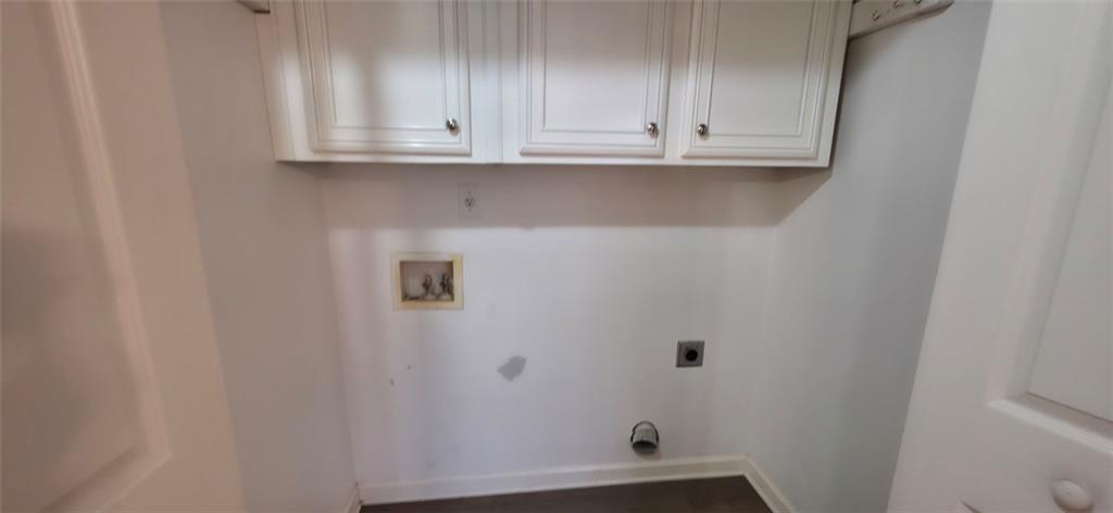 3813 North Bogan Road, Unit 2B Buford, GA 30519 - Photo 6 of 8 a view of cabinets and window