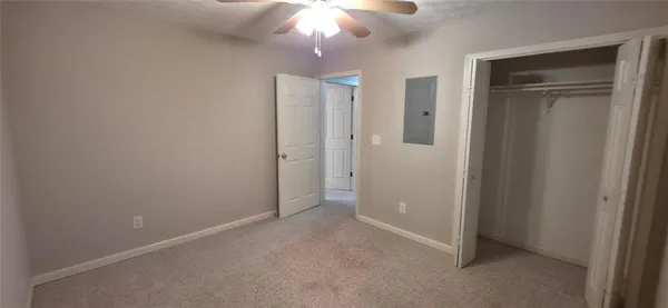 an empty room with a bathroom
