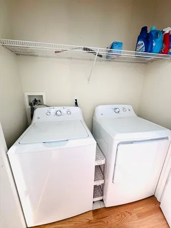 a utility room with dryer and washer