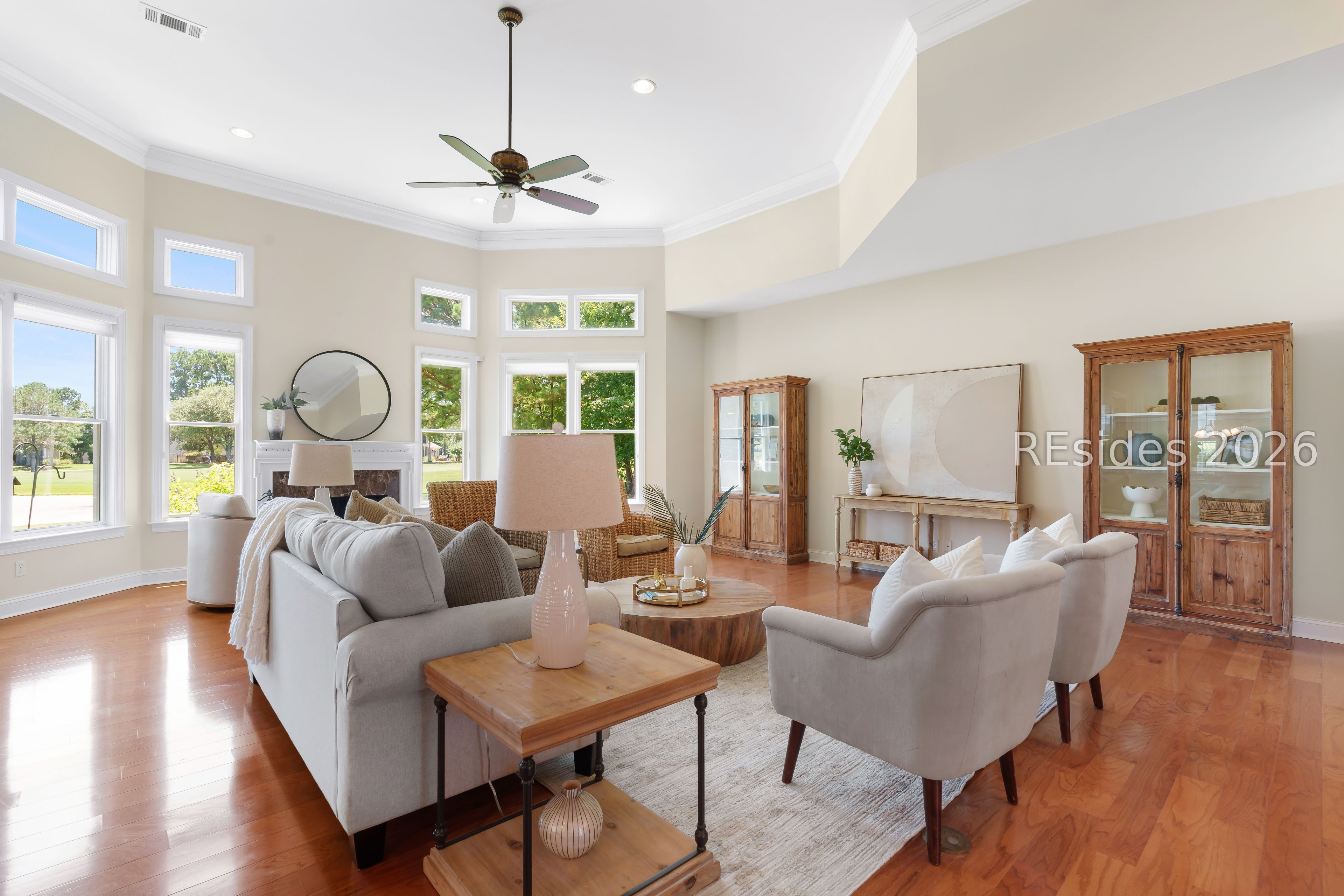 20 Chadbourne Street Bluffton, SC 29910 - Photo 10 of 29 The living room features high ceilings & fireplace