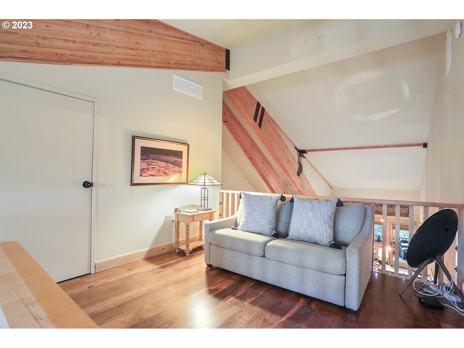 31226 East Collins Lake Road, Unit 27 Government Camp, OR 97028 - Photo 31 of 48 a living room with furniture and a wooden floor