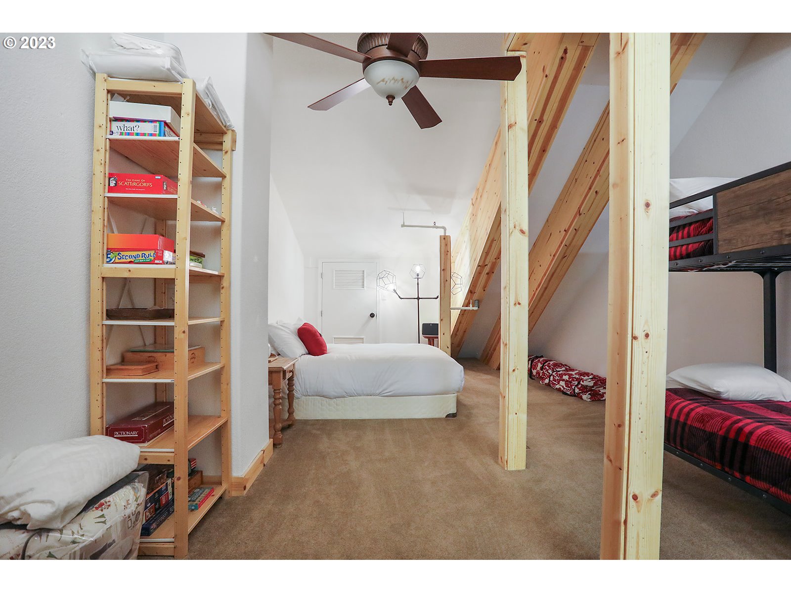 31226 East Collins Lake Road, Unit 27 Government Camp, OR 97028 - Photo 35 of 48 a living room with furniture and a window