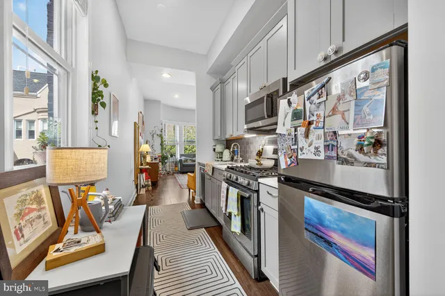 a view of kitchen and washer and dryer