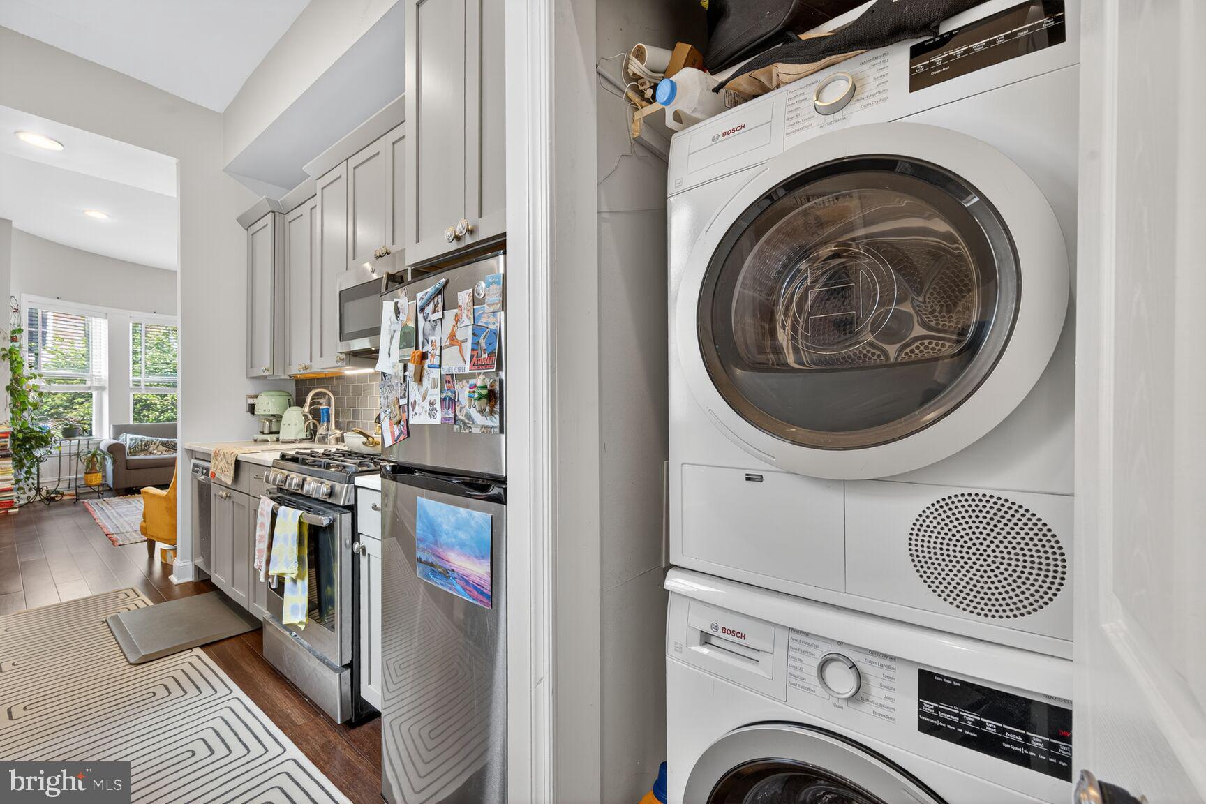 1409 Hopkins Street Northwest Washington, DC 20036 - Photo 16 of 44 a view of kitchen and washer and dryer