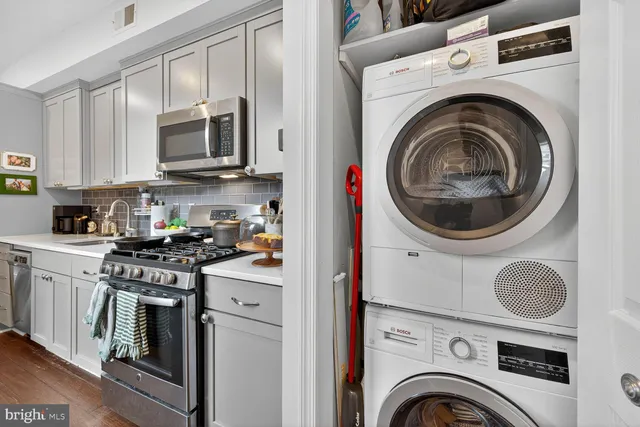 a bedroom with a bed and a cabinets