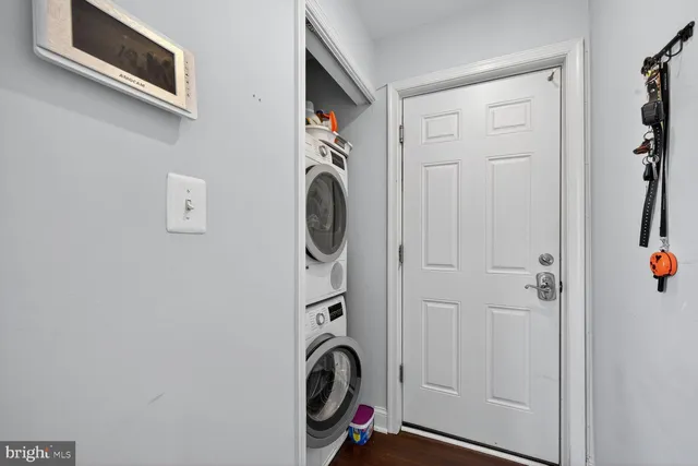 a kitchen with a sink a stove and cabinets