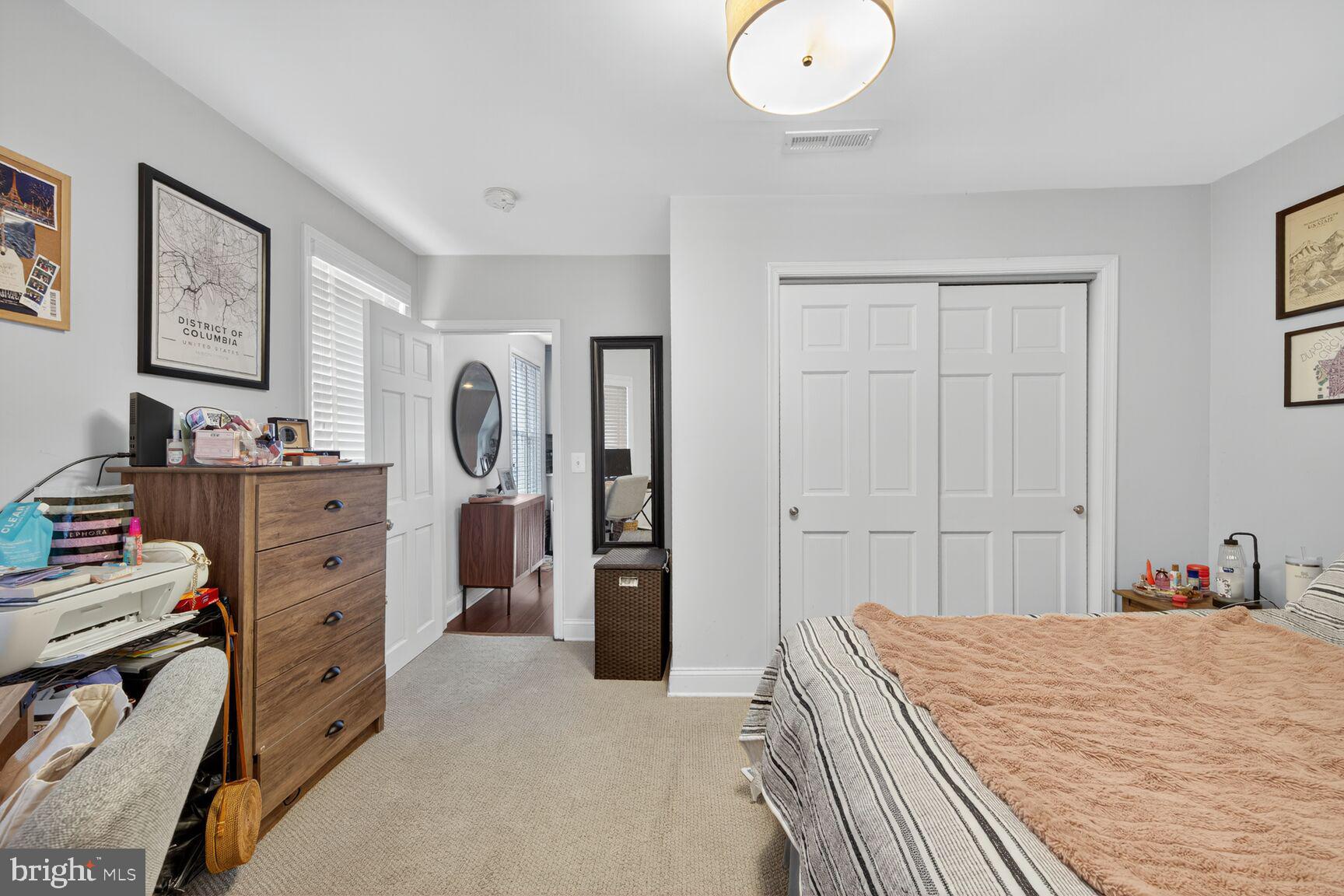 1409 Hopkins Street Northwest Washington, DC 20036 - Photo 36 of 44 a bed room with a bed and a television