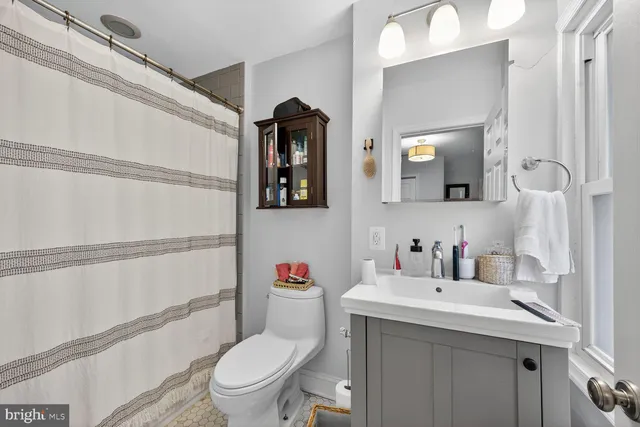 a car parked in front of a brick building