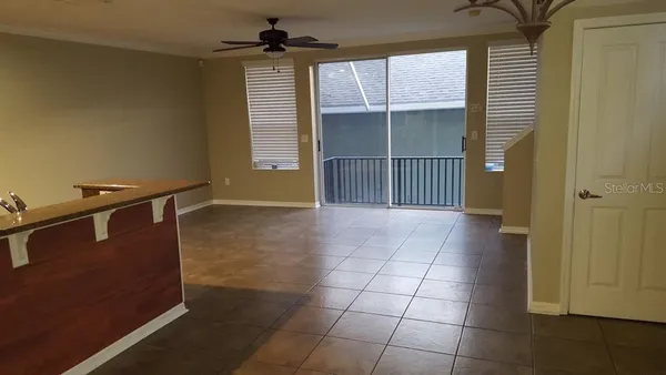 a view of a livingroom with a staircase