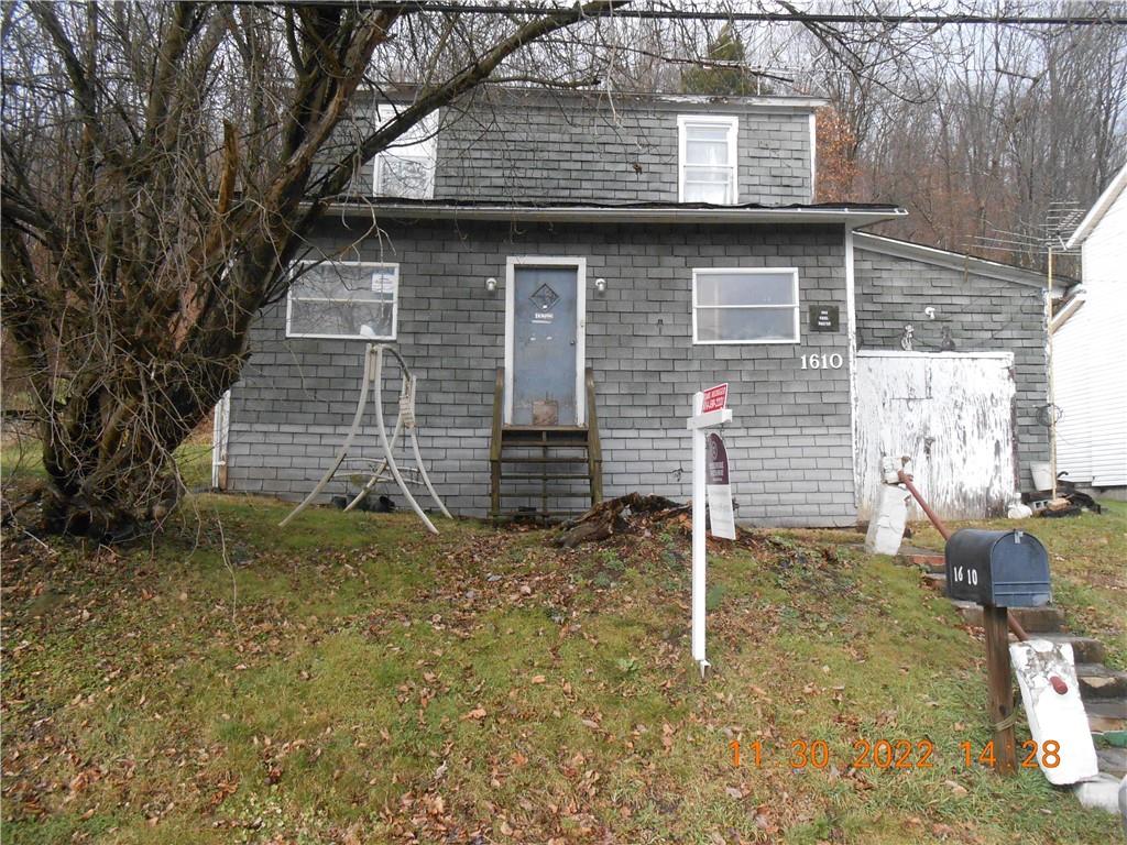 1610 Dixon Road Clymer, PA 15728 - Photo 1 of 14 a backyard of a house