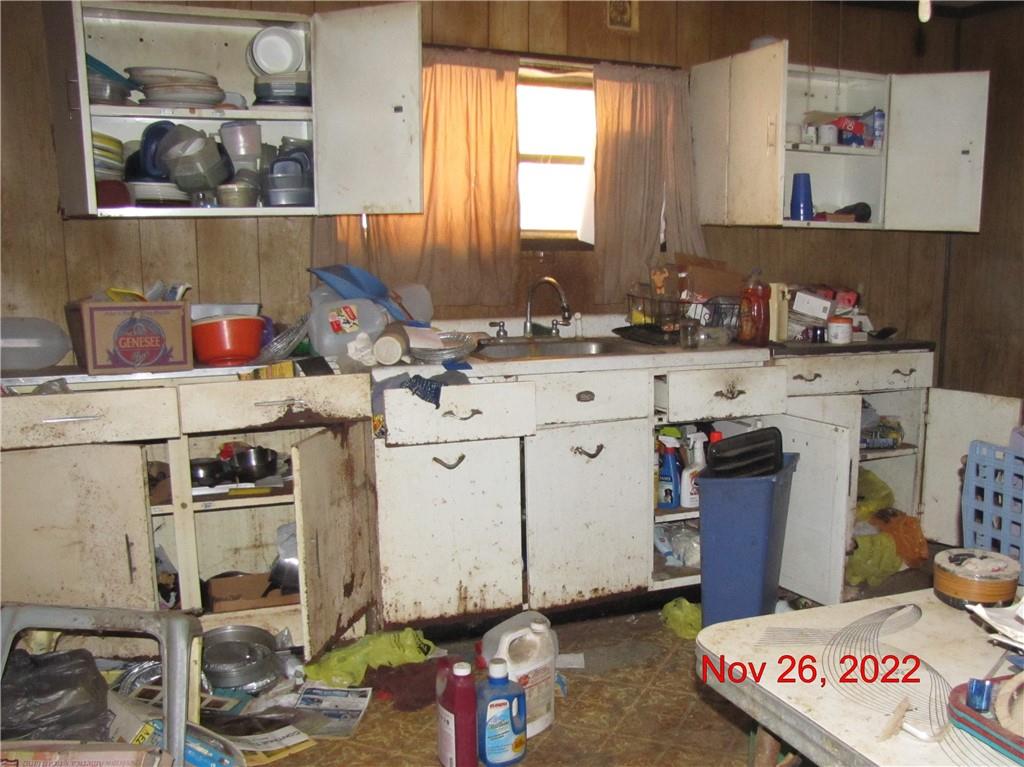 1610 Dixon Road Clymer, PA 15728 - Photo 12 of 14 a utility room with sink dryer and washer