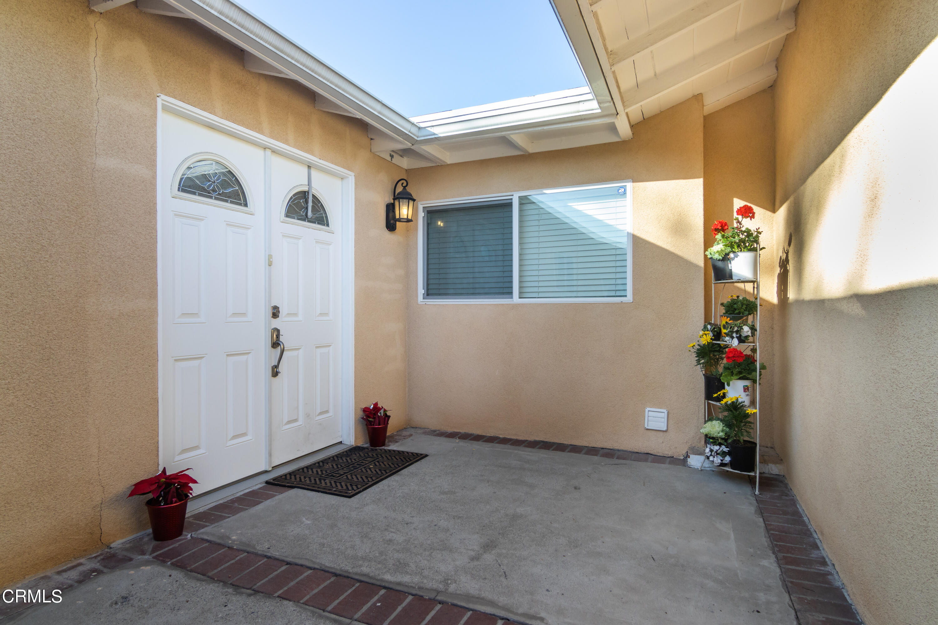 1275 Daveric Drive Pasadena, CA 91107 - Photo 2 of 29 a view of a house with a potted plant