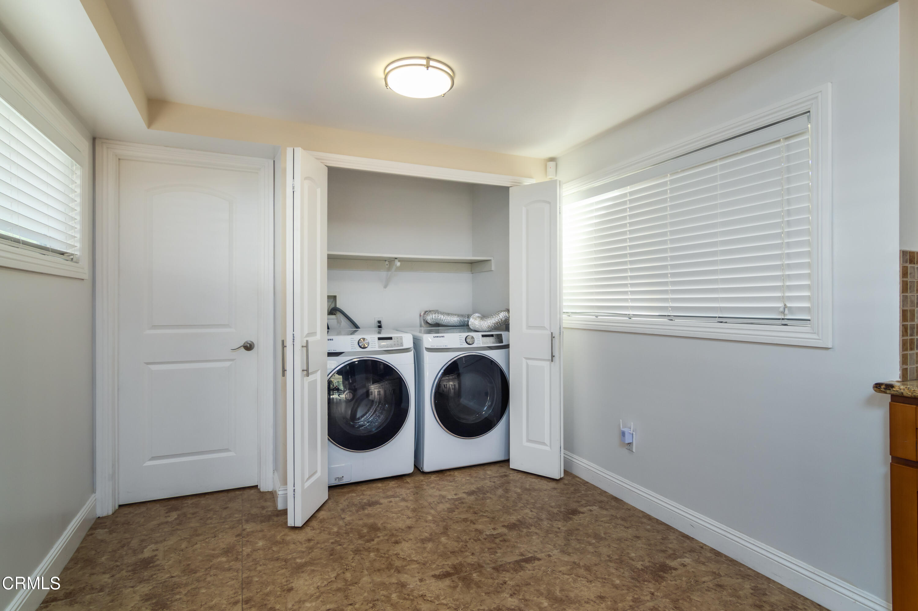 1275 Daveric Drive Pasadena, CA 91107 - Photo 12 of 29 a view of storage and utility room with washer and dryer
