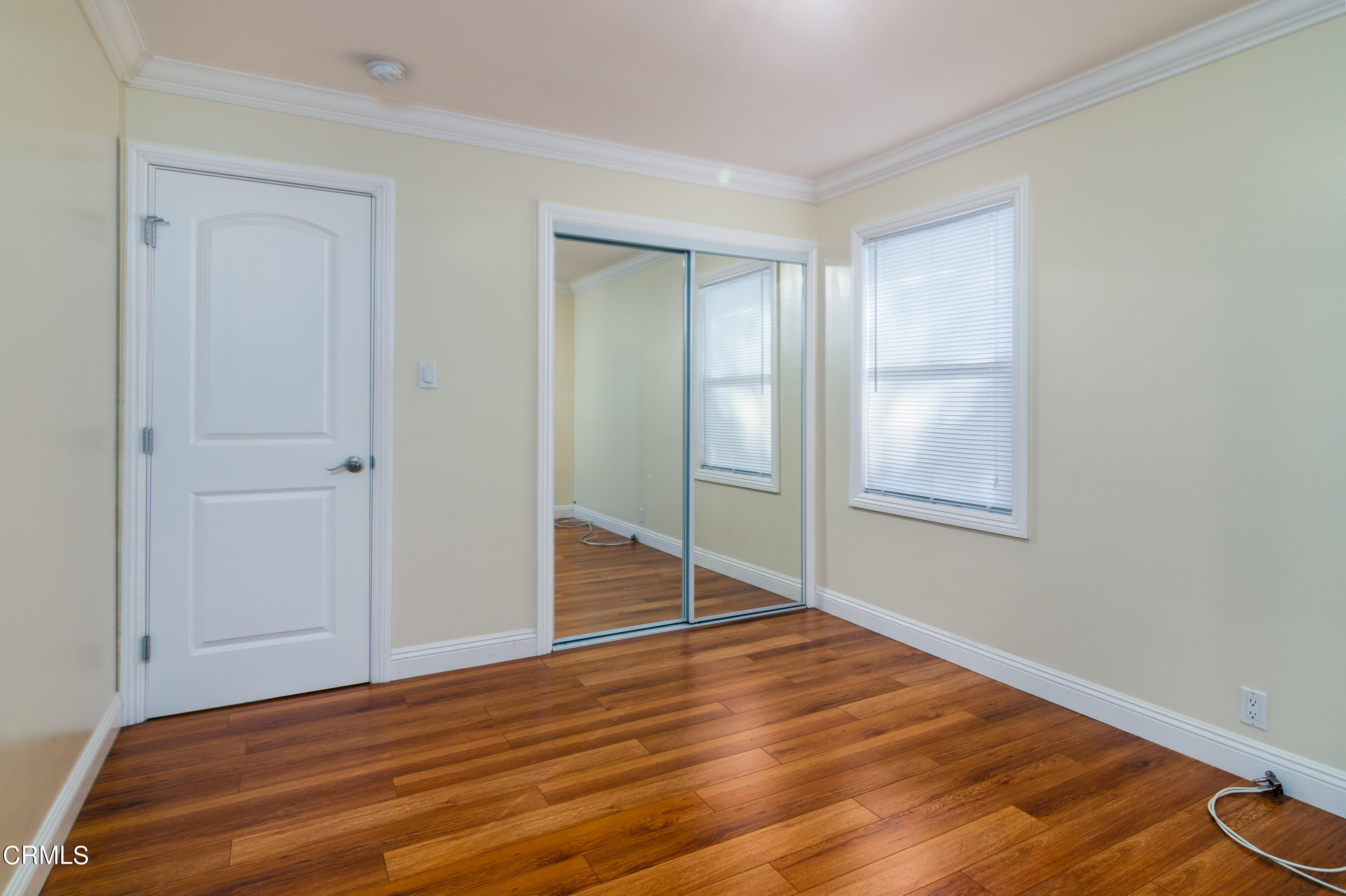 1275 Daveric Drive Pasadena, CA 91107 - Photo 15 of 29 a view of empty room with wooden floor