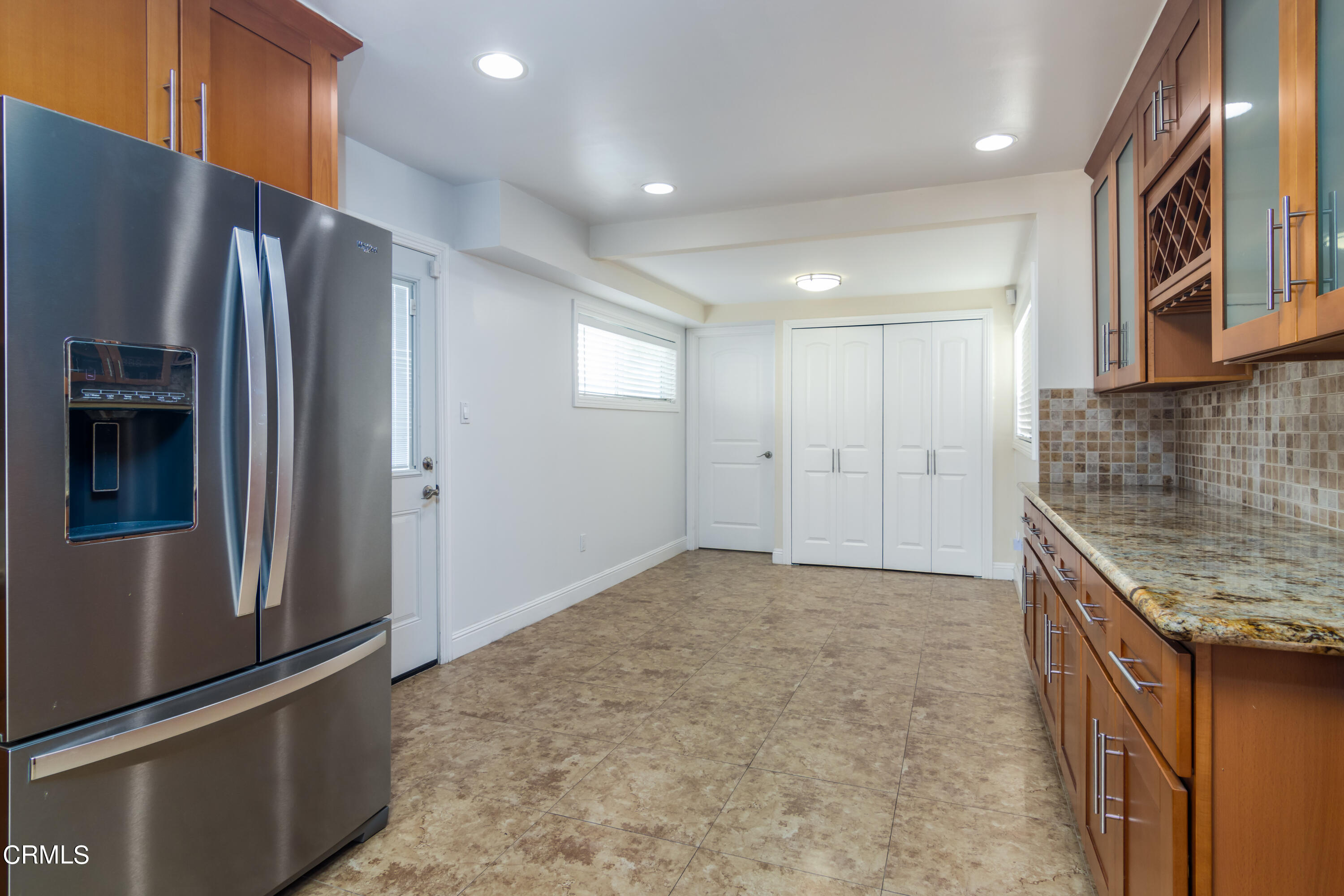 1275 Daveric Drive Pasadena, CA 91107 - Photo 10 of 29 a kitchen with stainless steel appliances granite countertop a refrigerator and a stove