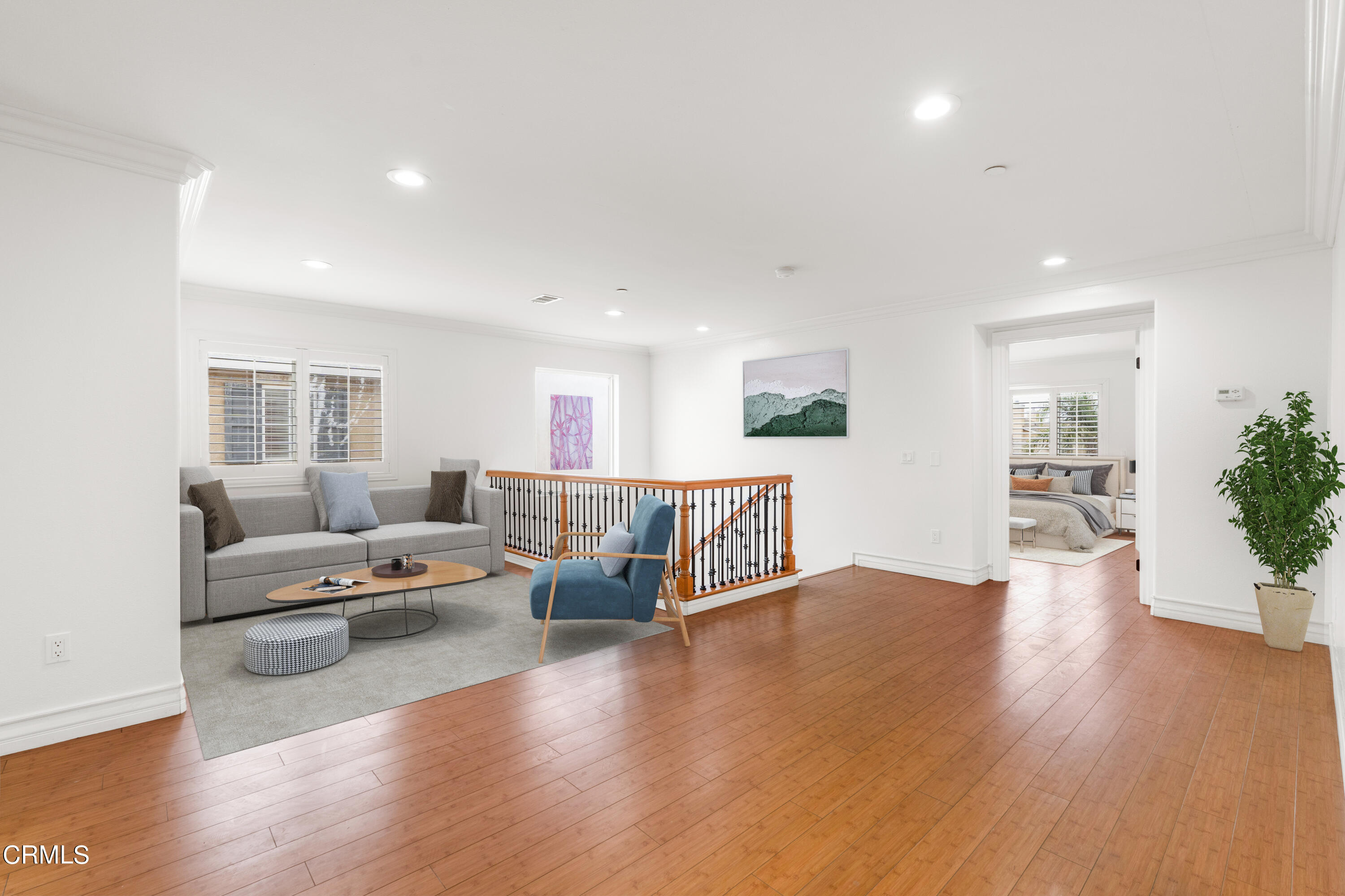 727 Entrada Drive Oxnard, CA 93030 - Photo 6 of 12 a living room with furniture wooden floor and a table