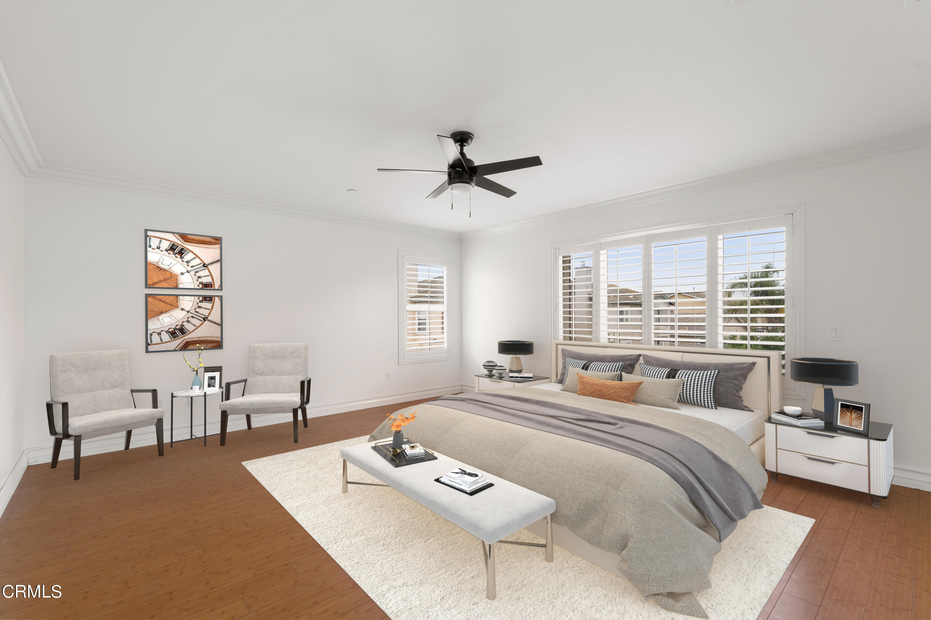 727 Entrada Drive Oxnard, CA 93030 - Photo 7 of 12 a spacious bedroom with a bed a couch and a chandelier