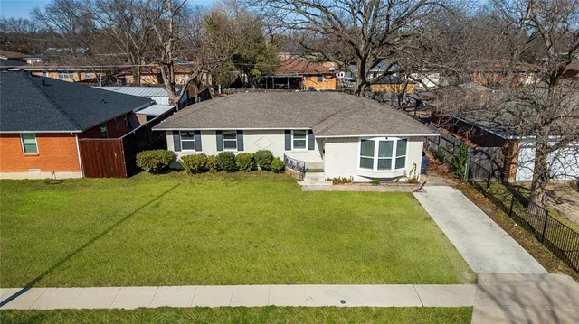 a house view with a garden space