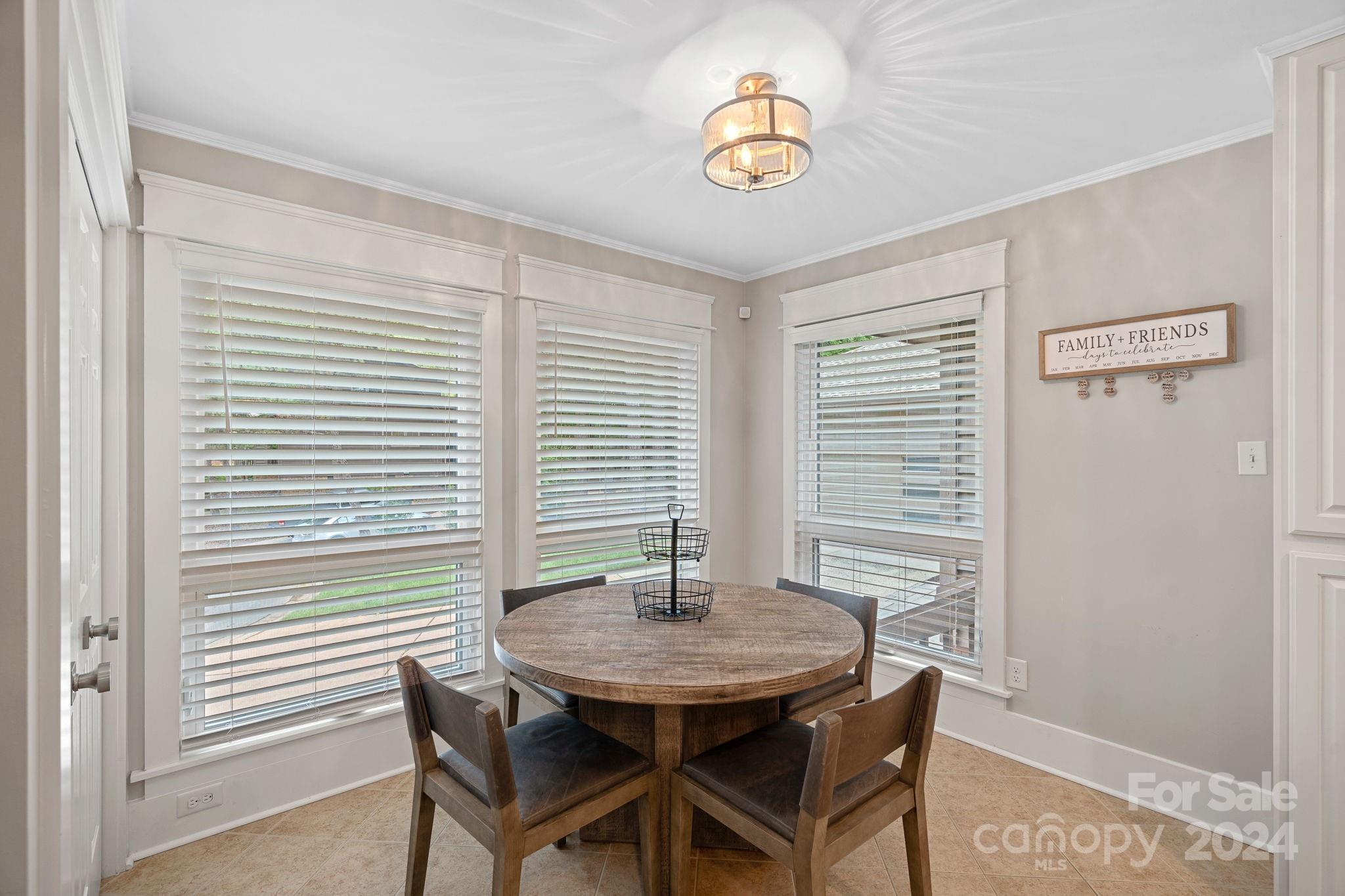 345 Jib Court Davidson, NC 28036 - Photo 15 of 40 a view of a dining room with furniture and window