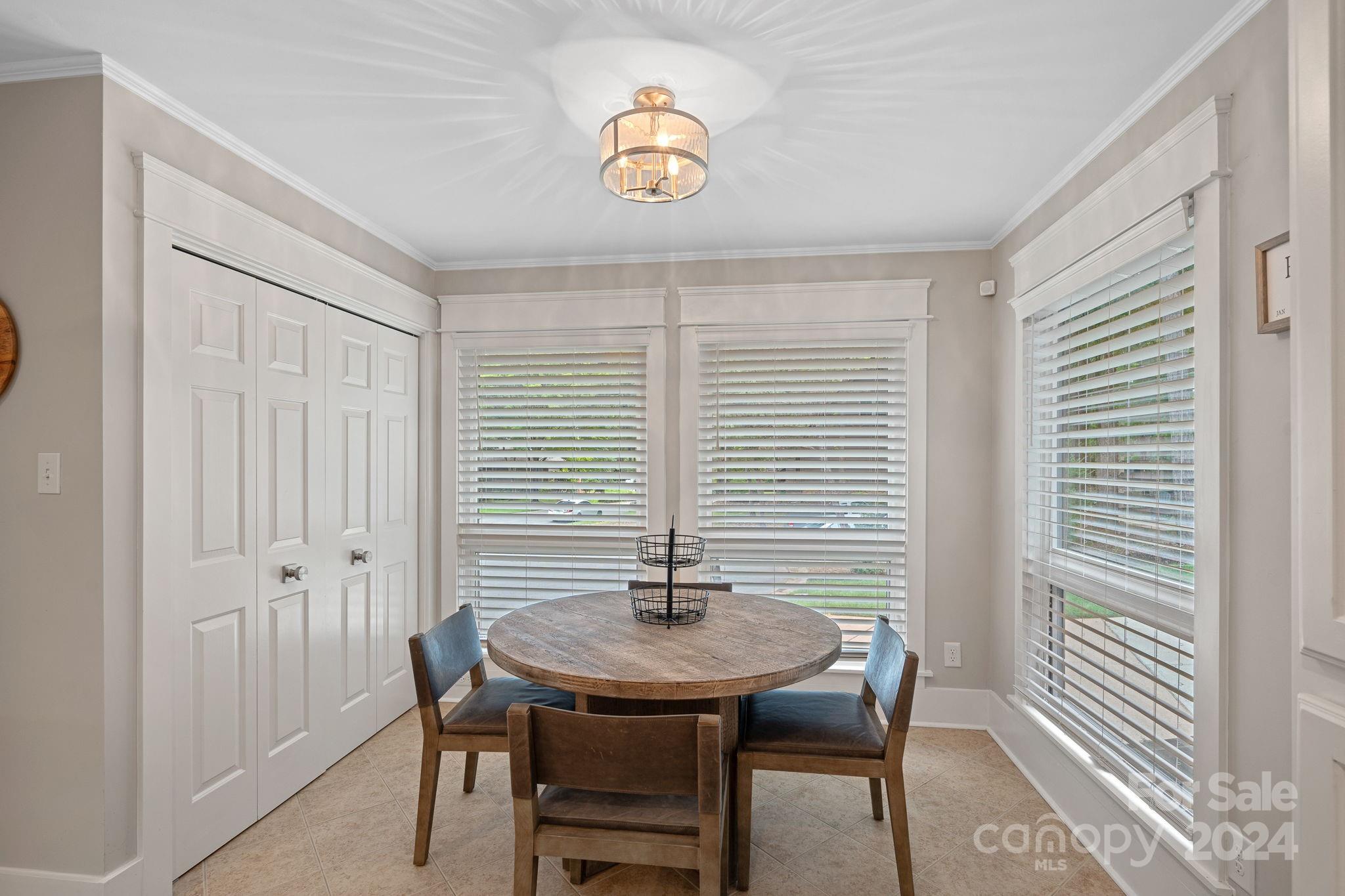 345 Jib Court Davidson, NC 28036 - Photo 16 of 40 a view of a dining room with furniture and window