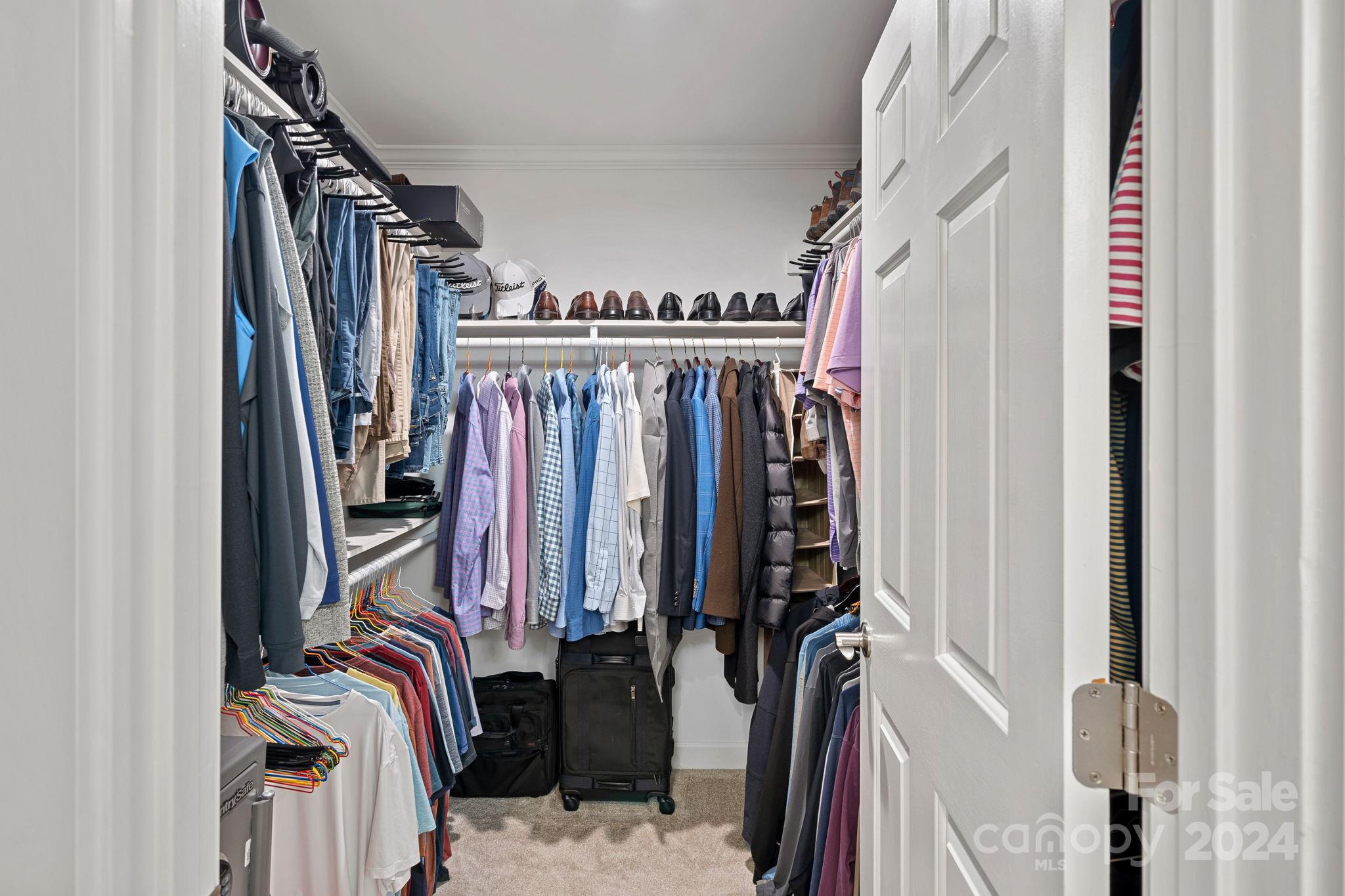 345 Jib Court Davidson, NC 28036 - Photo 26 of 40 a view of walk in closet with clothes