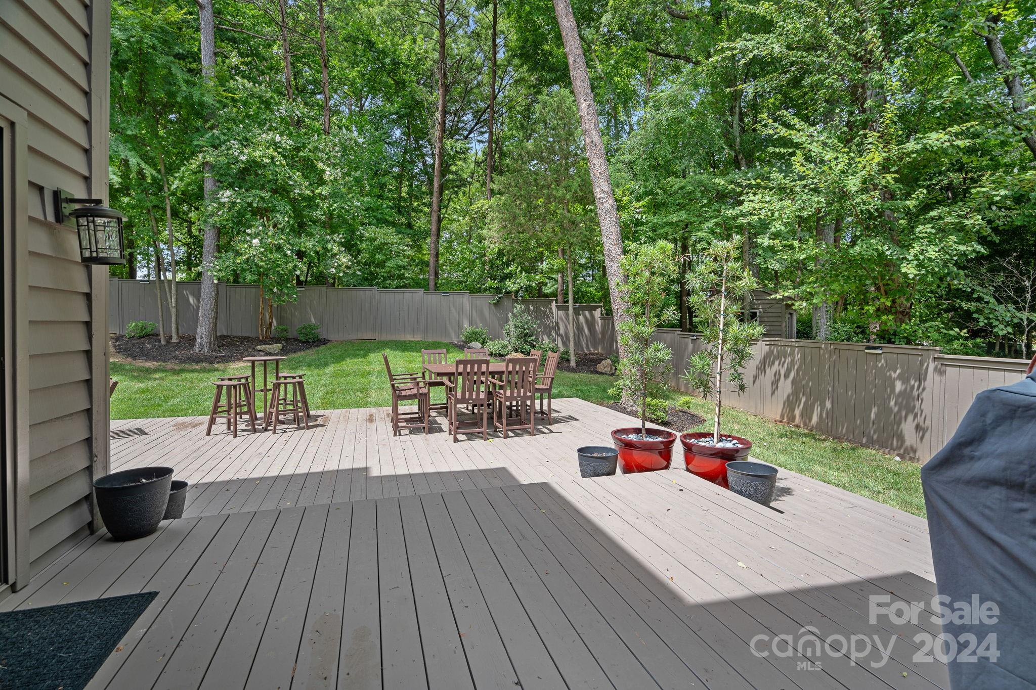 345 Jib Court Davidson, NC 28036 - Photo 28 of 40 a view of a table and chairs in patio of the house