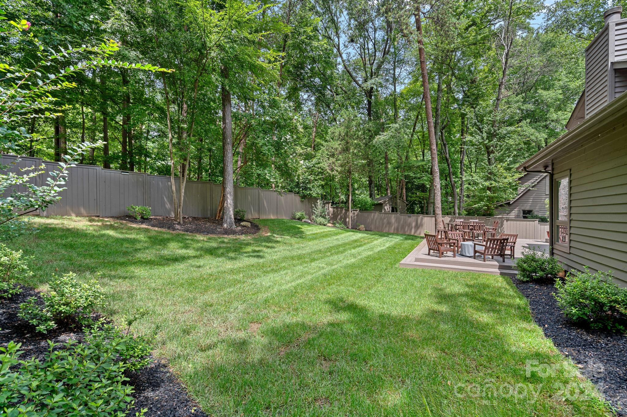 345 Jib Court Davidson, NC 28036 - Photo 32 of 40 a view of a backyard with sitting area